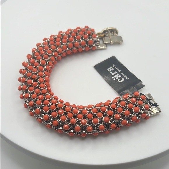 1346. Cara New York Gold and Orange Fold over Closure Bracelet - Picture 1 of 6